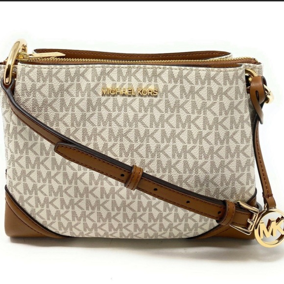 Michael Kors Handbags - MICHAEL KORS NICOLE TRIPLE COMPARTMENT CROSSBODY BAG IN COLOR VANILLA